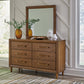 Lyncott California King Upholstered Bed with Mirrored Dresser